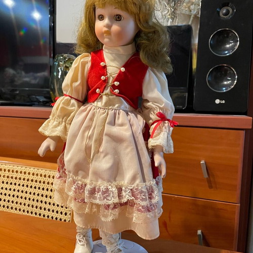 Vintage porcelain doll like new