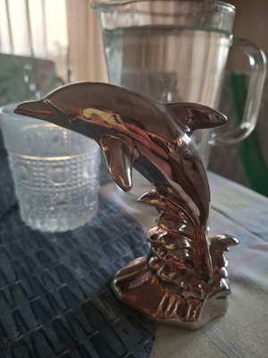 Metal dolphin decorative sculpture like new