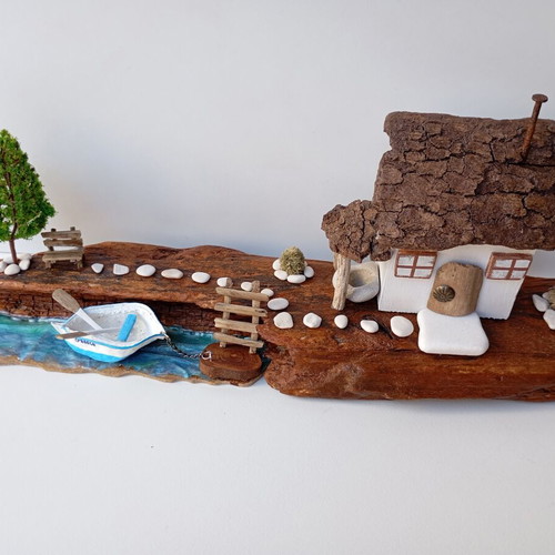 Handmade sea-themed driftwood diorama with Greek island house