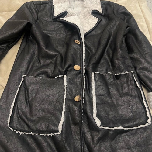 Women's mouton coat used black with white fur and wooden buttons