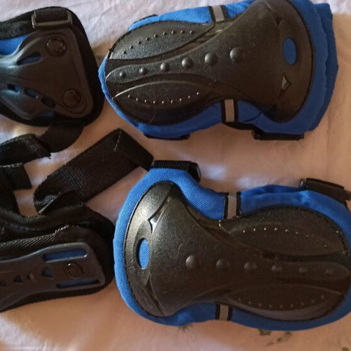 Children's helmet and knee and elbow protectors brand new