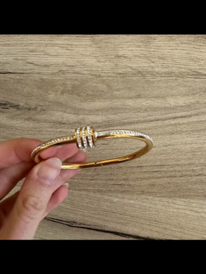 Bracelet bangle like new, gold with small diamonds
