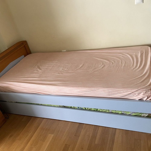 Wooden single bed with pull-out second bed, 2 mattresses and bedside table