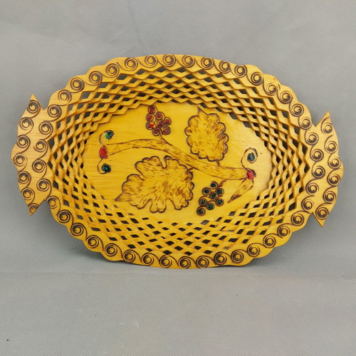 Old beautiful wooden fruit plate used