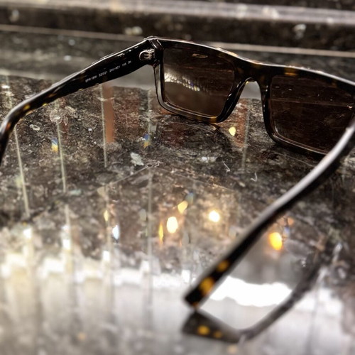 Prada sunglasses like new, unisex, black and brown