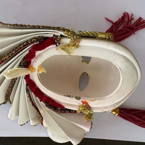 Decorative mask with red velvet details and gold embellishments, like new