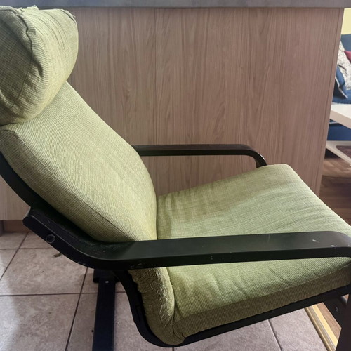 IKEA rocking armchair used, black frame and green cushions