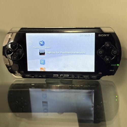 Sony PSP-1000 black handheld console with WiFi and 600+ games