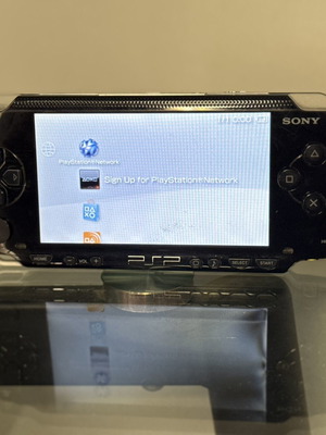 Sony PSP-1000 black handheld console with WiFi and 600+ games