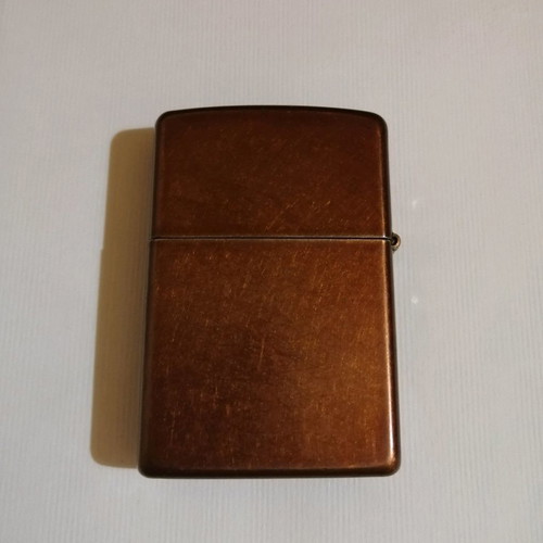 Zippo lighter used, bronze with applique Buddha design
