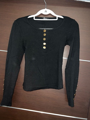 Black long-sleeve blouse used with gold details size small
