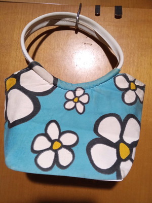 Handbag like new with floral design white and turquoise