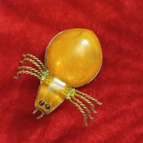 Russian brooch with amber used