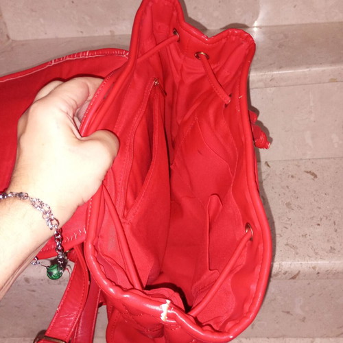Women's backpack used red with side pockets