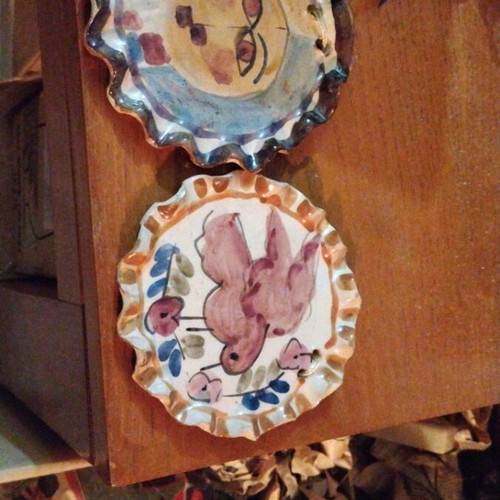 Ceramic plates like new with hand-painted traditional designs