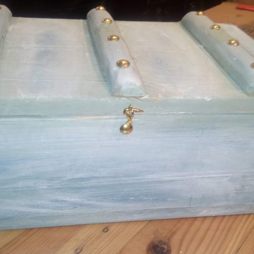 Handmade small furniture chests with varnish and decoration