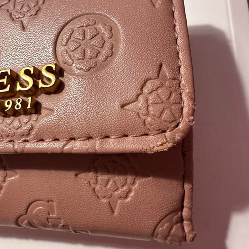 Guess wallet used, small size, pink with many compartments