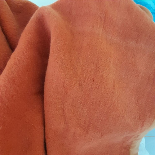 Wool blanket used, orange checkered bicolor