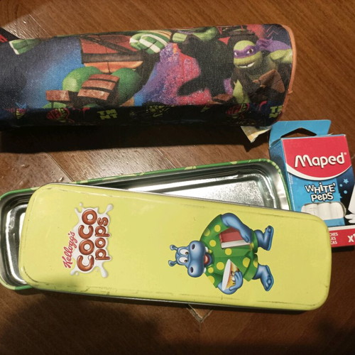 Various school supplies used with Giotto markers and pencil cases