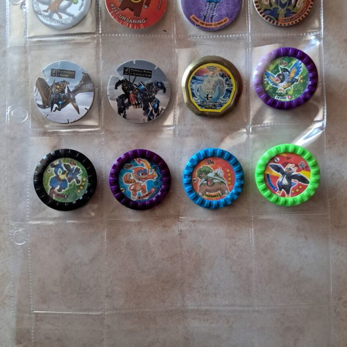 Various Pokémon, Megaman, Yugioh, Transformers caps.