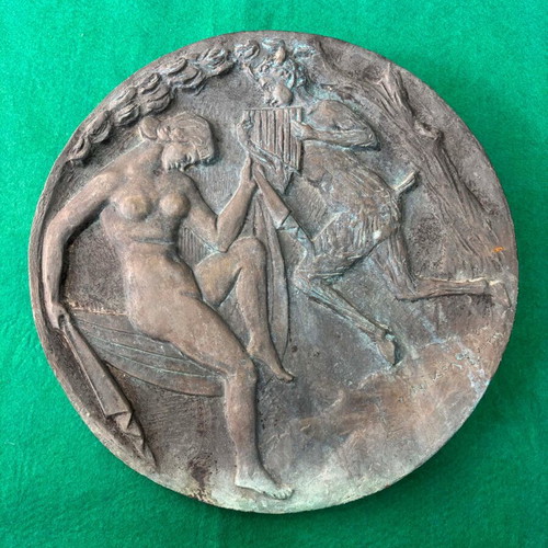Circular relief sculpture by Nikolas Pavlopoulos used, bronze depicting Pan and a Maenad