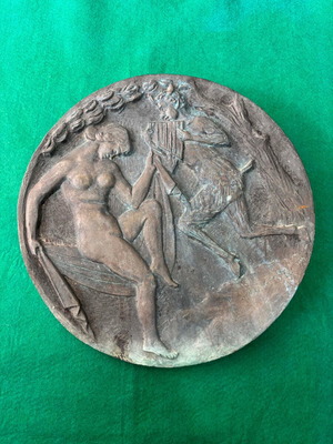 Circular relief sculpture by Nikolas Pavlopoulos used, bronze depicting Pan and a Maenad