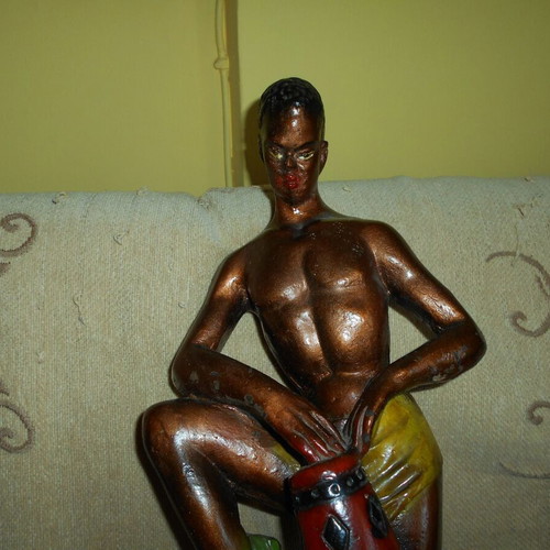 Tympanist statue used, 1950s, painted plaster, height 44 cm