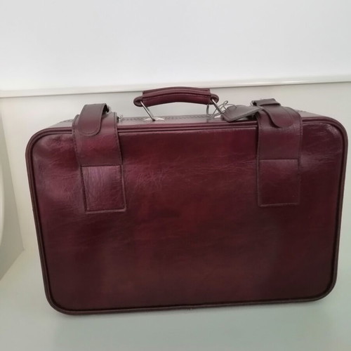 Vintage suitcase used, burgundy color, 1970s with metal clasps