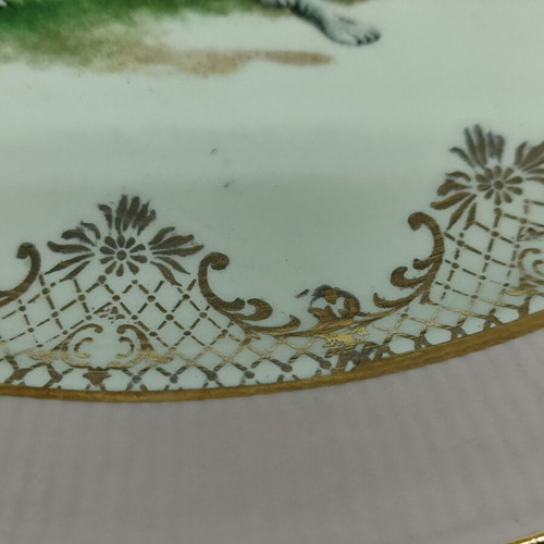 Porcelain plates used, two English with pink border