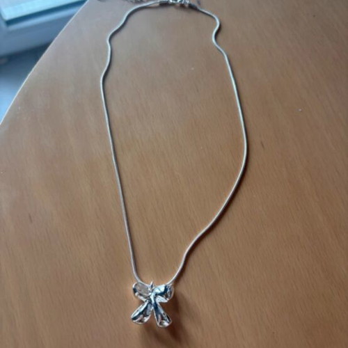 Necklace new silver with bow