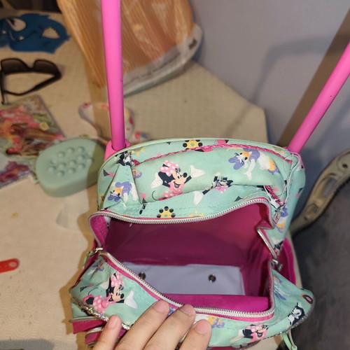 Minnie bag with wheels like new, pink