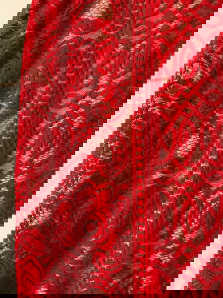 Red lace with beige lining knee length skirt. New with tags