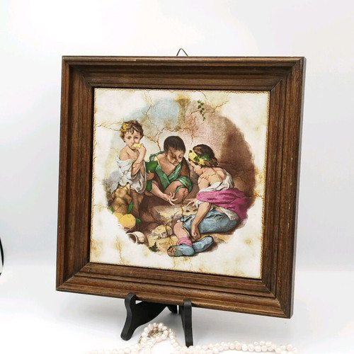 Vintage ceramic picture used with wooden frame