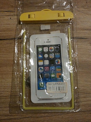 Waterproof case in yellow color, new