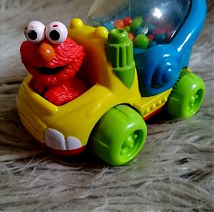Elmo juggling car
