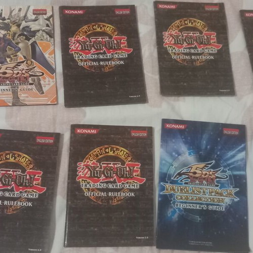 Yu-Gi-Oh! rule books and deck zones, like new, set of 14 each