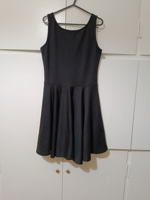 JLo black dress medium, alpha line knee length, like new