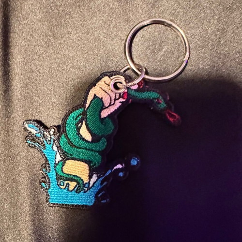 Caravan embroidered keychain like new, multicolor