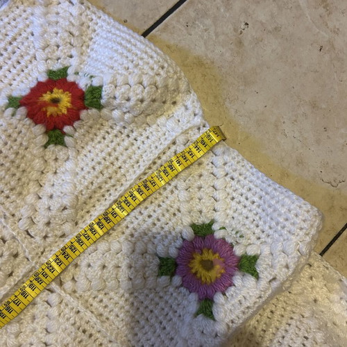 Handmade blanket used with floral crochet design