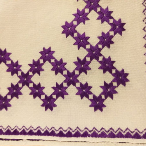 Handicrafts used, set of three table linens with purple star pattern