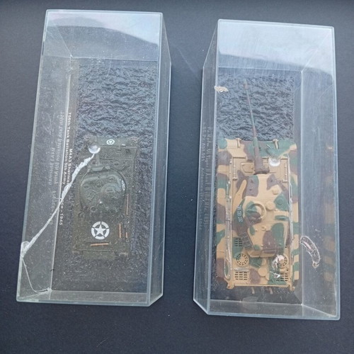 Collectible 1:72 scale tank models used with protective cases