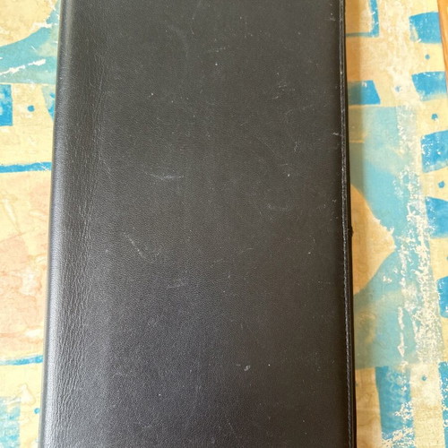 Large leather wallet used with multiple compartments, black