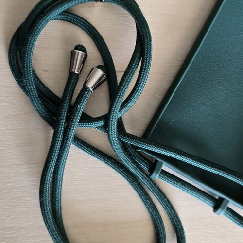 Samsung S24 Ultra case used with green silicone lanyard