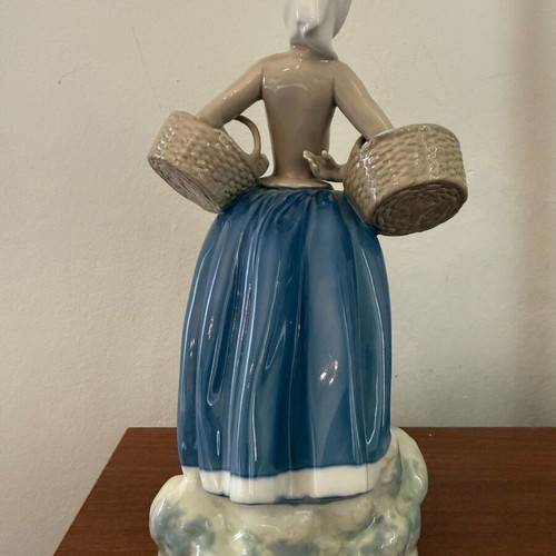 Porcelain decorative village girl like new, handmade
