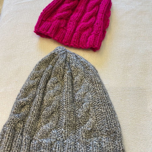 Knitted hats with braids like new, set of 2, fuchsia and gray