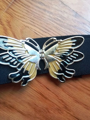 Vintage elastic belt with butterfly buckle like new, black