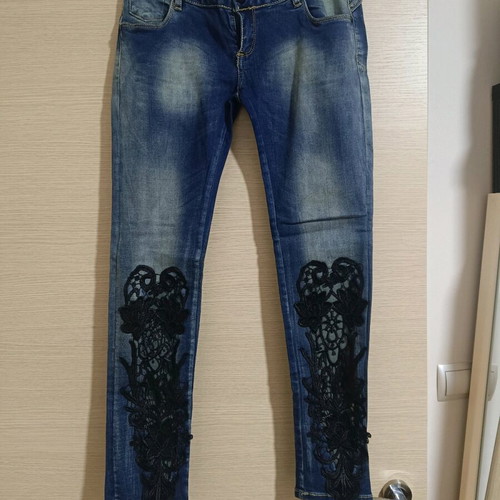 Jeans with black embroidery large like new