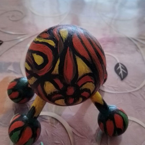 Wooden hand-painted massager