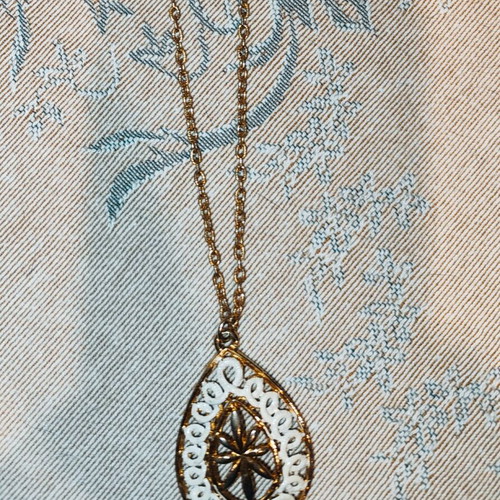 Necklace used with long chain and gold-plated teardrop pendant