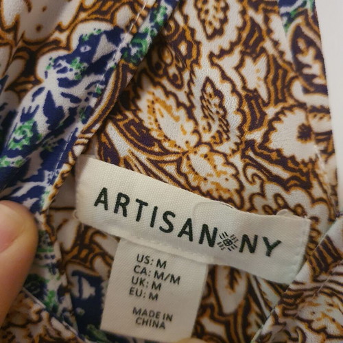Top printed with criss-cross back, like new, size M